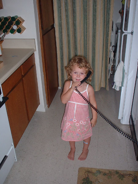 Savannah on the phone with Aunt Owie.jpg 74.8K